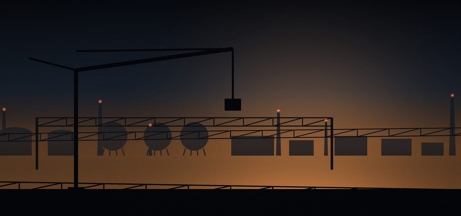 Fabrication yard at dusk with a tower crane